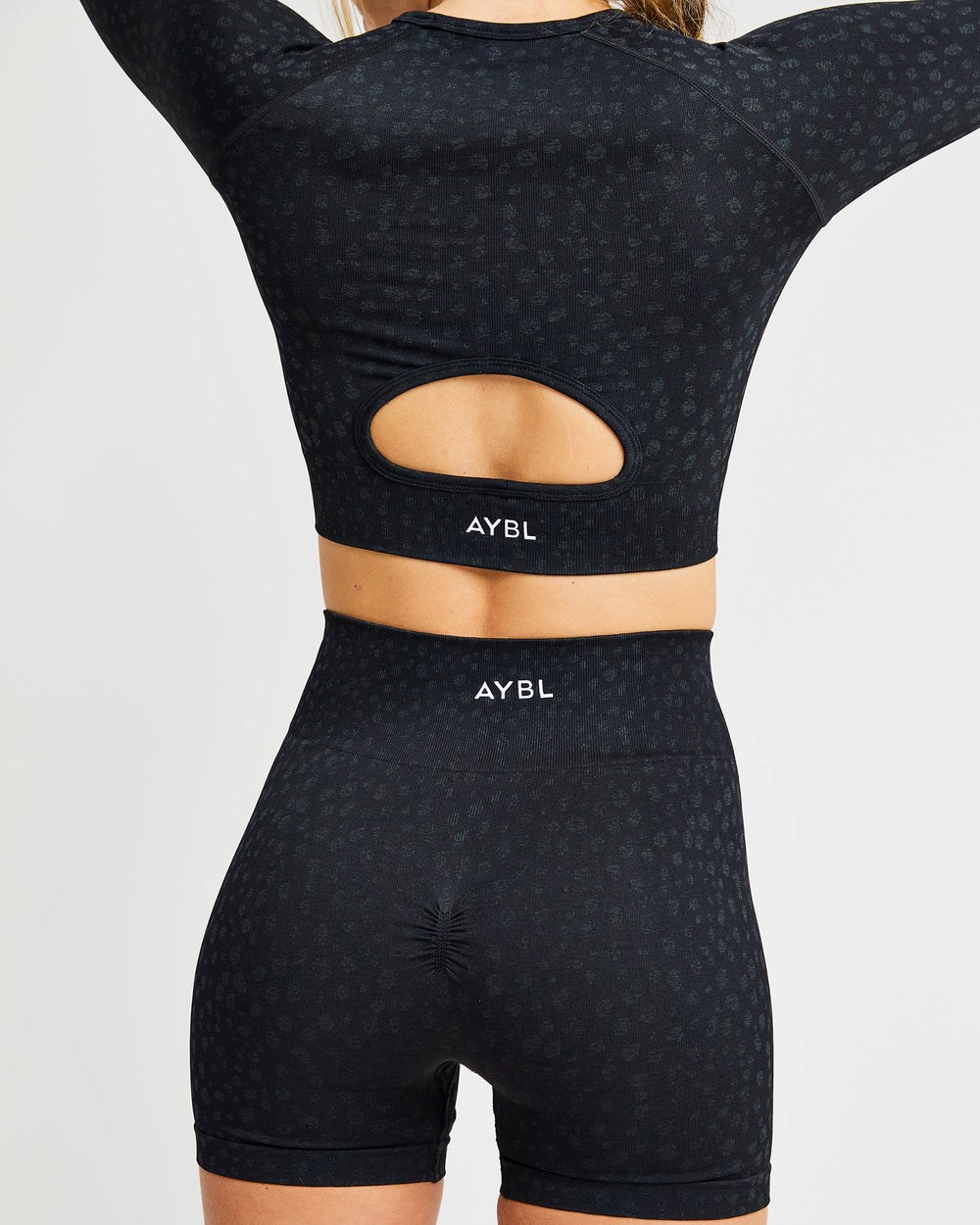 AYBL Evolve Speckle Seamless Long Sleeve Crop Top Schwarz | 20193-LYZE