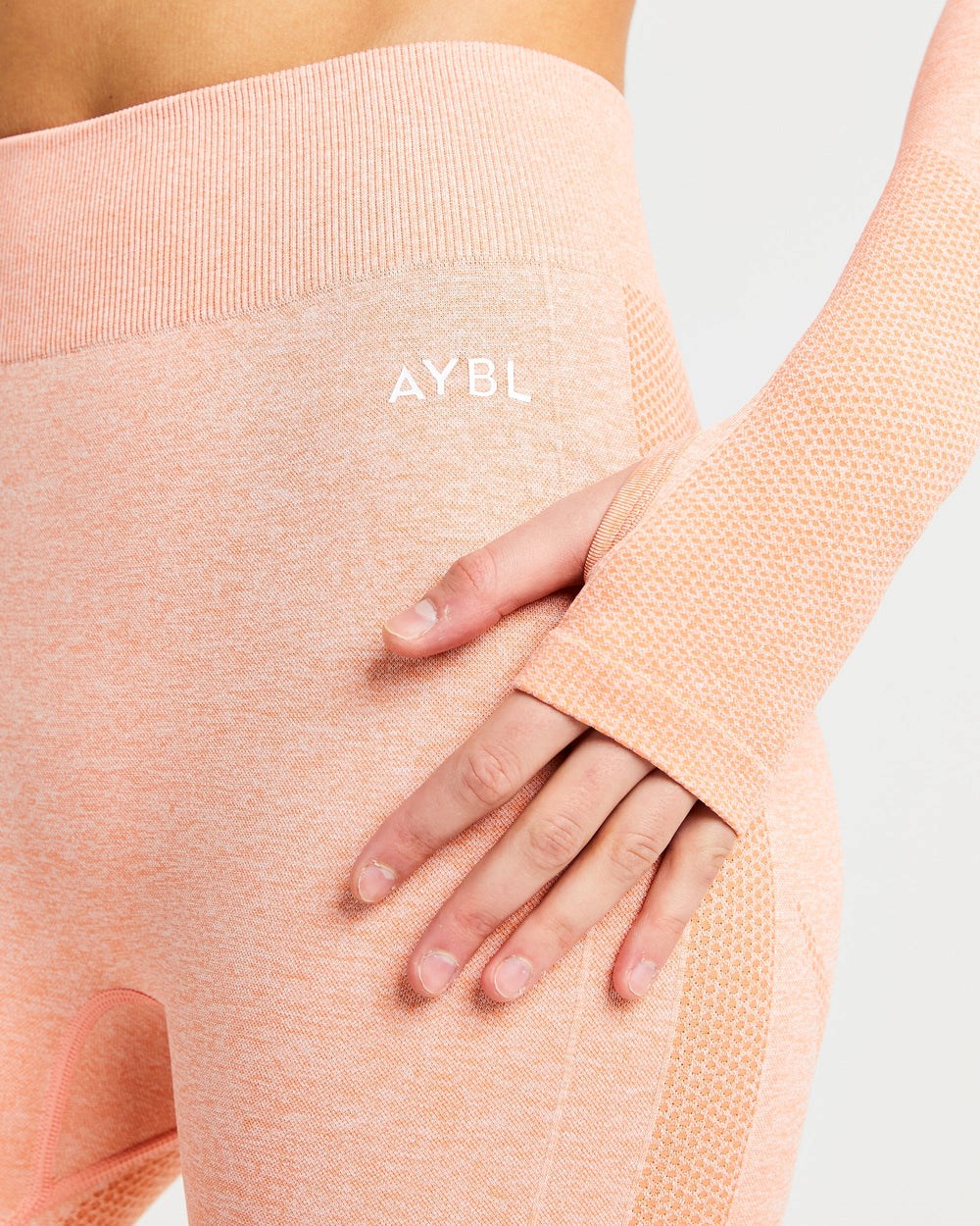 AYBL Motion Seamless Long Sleeve Crop Top Peach Marl | 41528-HPMB